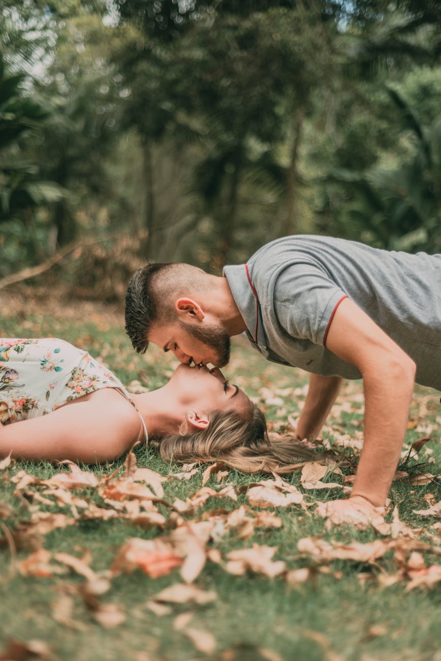 photo of man kissing woman